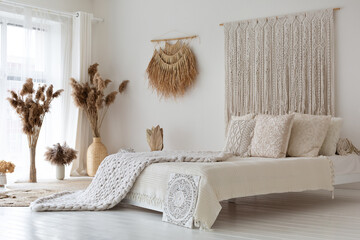 Empty white bedroom made in ethnic style
