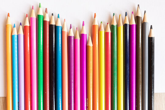 Colorful Wooden Crayons on white background