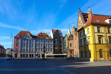 Fototapeta na wymiar old town hall building with a clock in the center on Wroclaw Square Poland