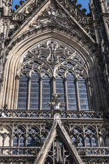 Fototapeta premium Details of Cologne cathedral (Cathedral Church of Saint Peter, from 1248). Cologne Cathedral - High Gothic five-aisled basilica, with a projecting transept and a tower facade. Cologne, Germany.