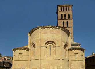 Fototapeta premium Romanesque church of San Lorenzo. (12th century). View of the apses and the bell tower. Historic city of Segovia. Spain.