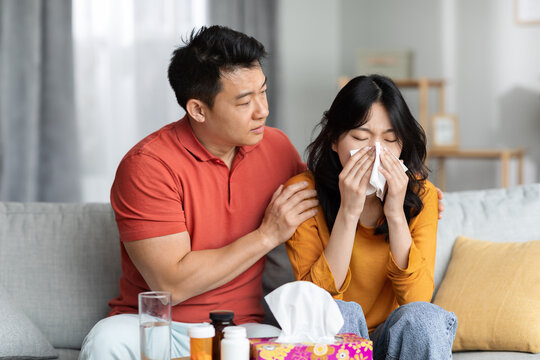 Loving Husband Taking Care Of Sick Wife At Home