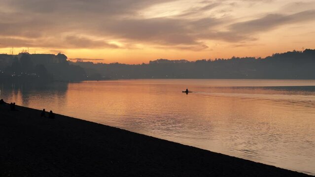 Watching from afar Kayak in puerto varas chile