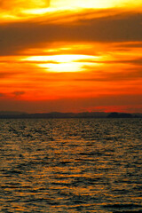 Sunset sky scenery by the coast at Besar Island or Pulau Besar in Mersing, Johor, Malaysia