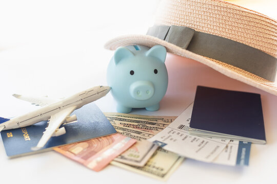 Travel or vacation money saving concept, piggy bank