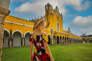 Girl in a hat near the Basilica of San Antonio de Padua. Izamal, Mexico