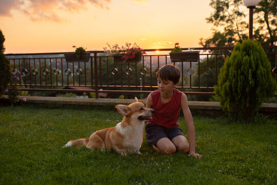 Child , playing with him in garden, teaching him new stuff
