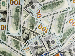 Fototapeta na wymiar Group of money stack of 100 US dollars banknotes.