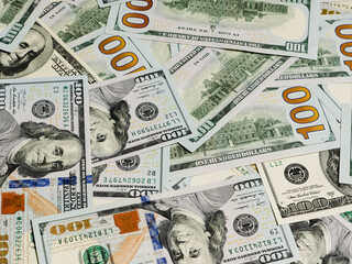 100-dollar bills close-up view from above.