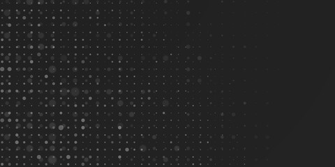 Abstract background in black colors made of big and small dots
