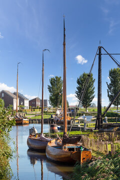 Old wooden fishing boats at the shipyard 'De Hoop' near the picturesque town of Workum in Friesland.