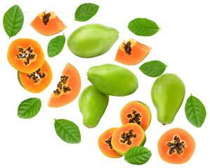 flying ripe papaya fruits with green leaves isolated on white background. exotic fruit. clipping path