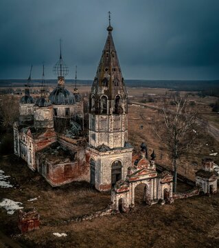 Scenic view of the abandoned Church of the Resurrection of Christ on Ostrov village on a gloomy day