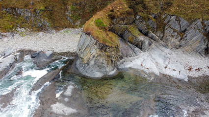 Cape Stolbchaty on the island of Kunashir, Kuril Islands, aerial drone point of view.