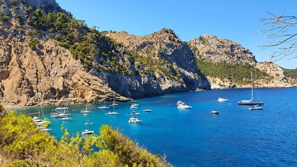 Beautiful natural beach Coll Baix (Platja des Coll Baix), Alcudia, Mallorca (Majorca). Amazing view of the turquoise clear sea of Mallorca.