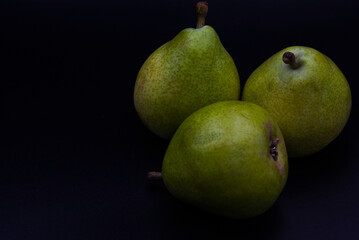 Fototapeta na wymiar pears fruit on black background,