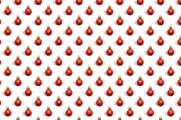 Christmas New Year holiday creative minimal seamless pattern white background with red baubles balls decorations, ornaments, Flat lay, top view