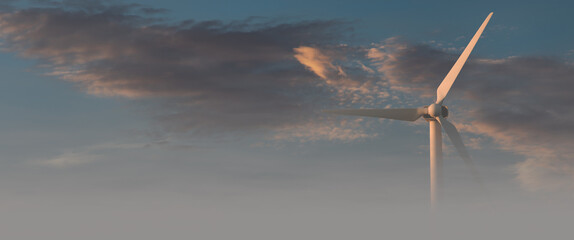 A giant wind turbine is visible in the fog. A giant wind turbine is visible in the fog. Waste-free...