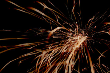 sparks in the dark. lines of light.