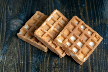 square sweet soft waffles on the table