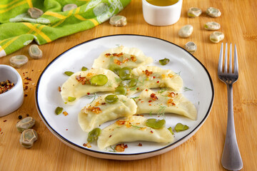  Homemade dumplings stuffed with broad beans. Vegetarian version of dumplings