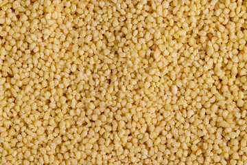 Fresh raw porridge couscous from wheat or millet