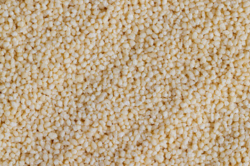 Fresh raw porridge couscous from wheat or millet