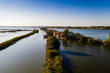 Aerial view of fishing lodges, Comacchio lagoon on sunset, Northern Italy