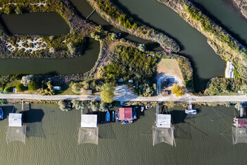Aerial view of fishing lodges, Comacchio lagoon on sunset, Northern Italy