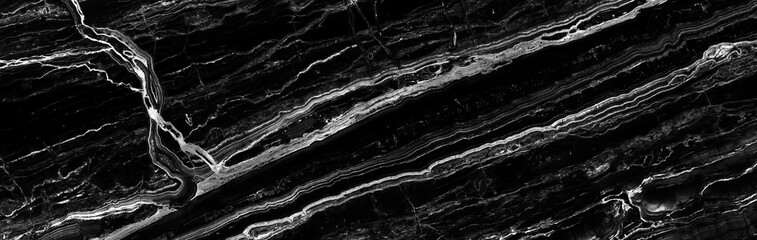 Obraz na płótnie Canvas black marble background. black Portoro marbl wallpaper and counter tops. black marble floor and wall tile. black travertino marble texture. natural granite stone.