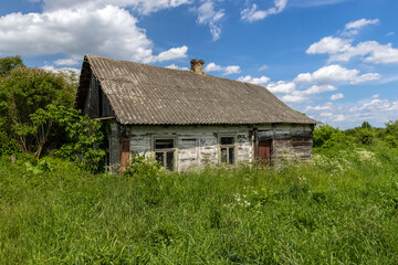 Fototapeta na wymiar An old abandoned wooden house