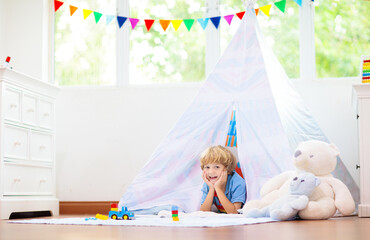 Kids room with teepee tent. Child bedroom.