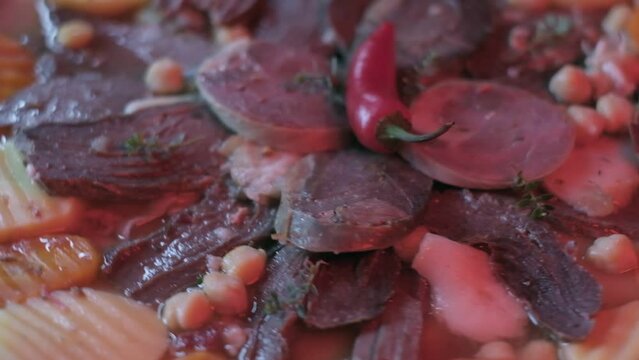 Close-up of national Kazakh dish Beshbarmak made of veggies