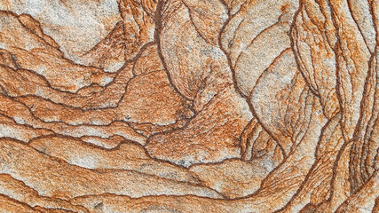 A colorful natural stone with layer structure as a background