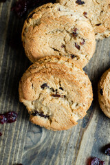 delicious dried cookies made of high-quality flour with dried red cranberries on the table