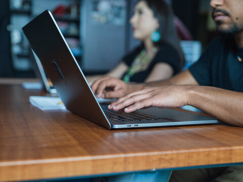 Close up of a students hands typing