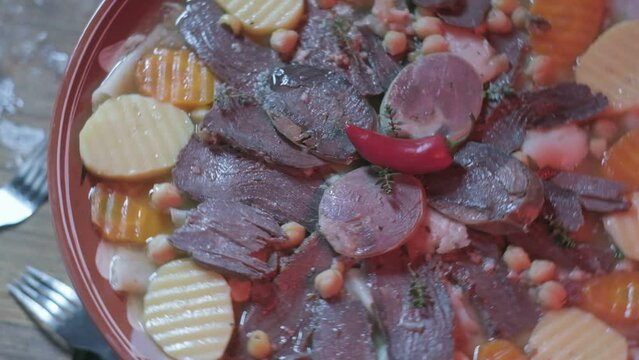 Close-up of national Kazakh dish Beshbarmak made of veggies