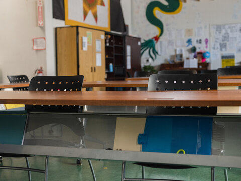 Empty classroom with a colorful background