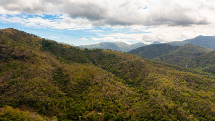 Aerial view of Mountains with rainforest and clouds. Sri Lanka.