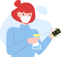 Young female disinfect her device with sanitizer spray. 