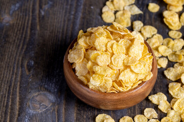 dry breakfast corn flakes of yellow color , close up
