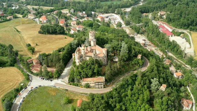Aerial drone panoramic view of the Rocchetta Mattei castle in Italy on sunny summer day, view from above. High quality 4k footage