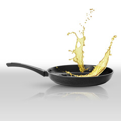 Frying pan and splashing cooking oil on white background