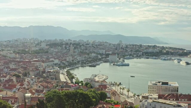 Aerial view Split Croatia. The historical center of the city, the embankment with boats, the port in the mountainous landscape on the seashore. High quality 4k footage