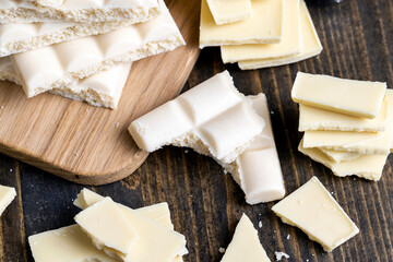 a white chocolate bar broken into pieces