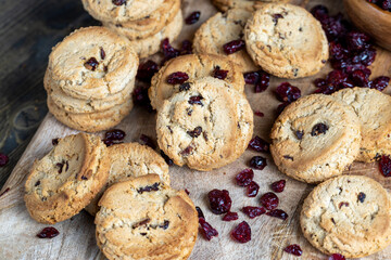 delicious dried cookies made of high-quality flour with dried red cranberries on the table