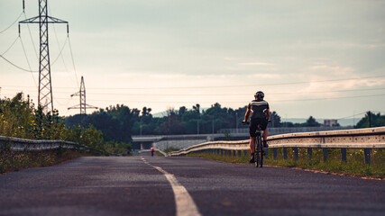 Fototapeta premium Cinematic shot of a cyclist
