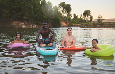 Friends swimming, relax and enjoy fun summer vacation, holiday or trip to a lake portrait. Young, diverse and traveling men and woman on a youth, camp and adventure lifestyle retreat - Powered by Adobe
