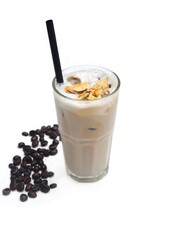 Coffee milk shake with burnt coconut and coffee beans isolated on white background