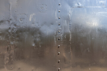 Part of the metal structure of an old steam locomotive
